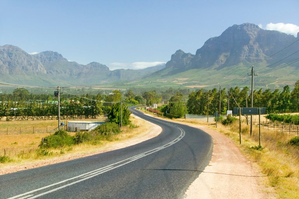 Empty road to Stellenbosch wine region, outside of Cape Town, South Africa